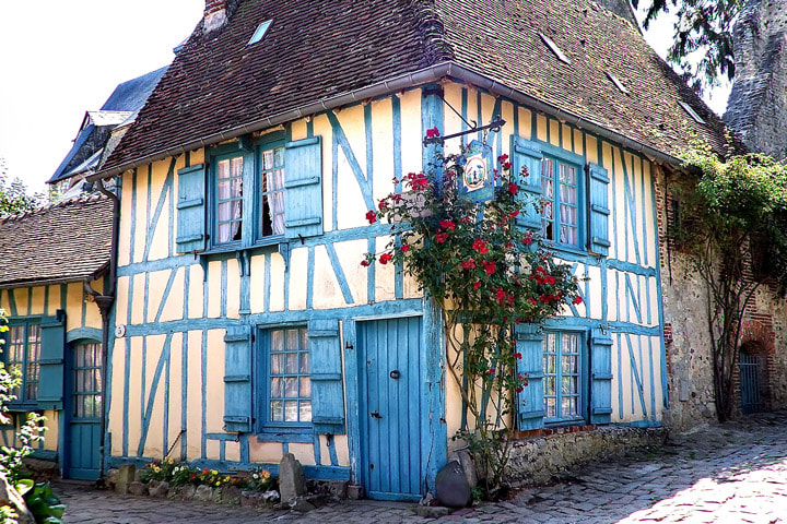 Medieval house in Gerberoy, a most flowered village of France, vehicles prohibited